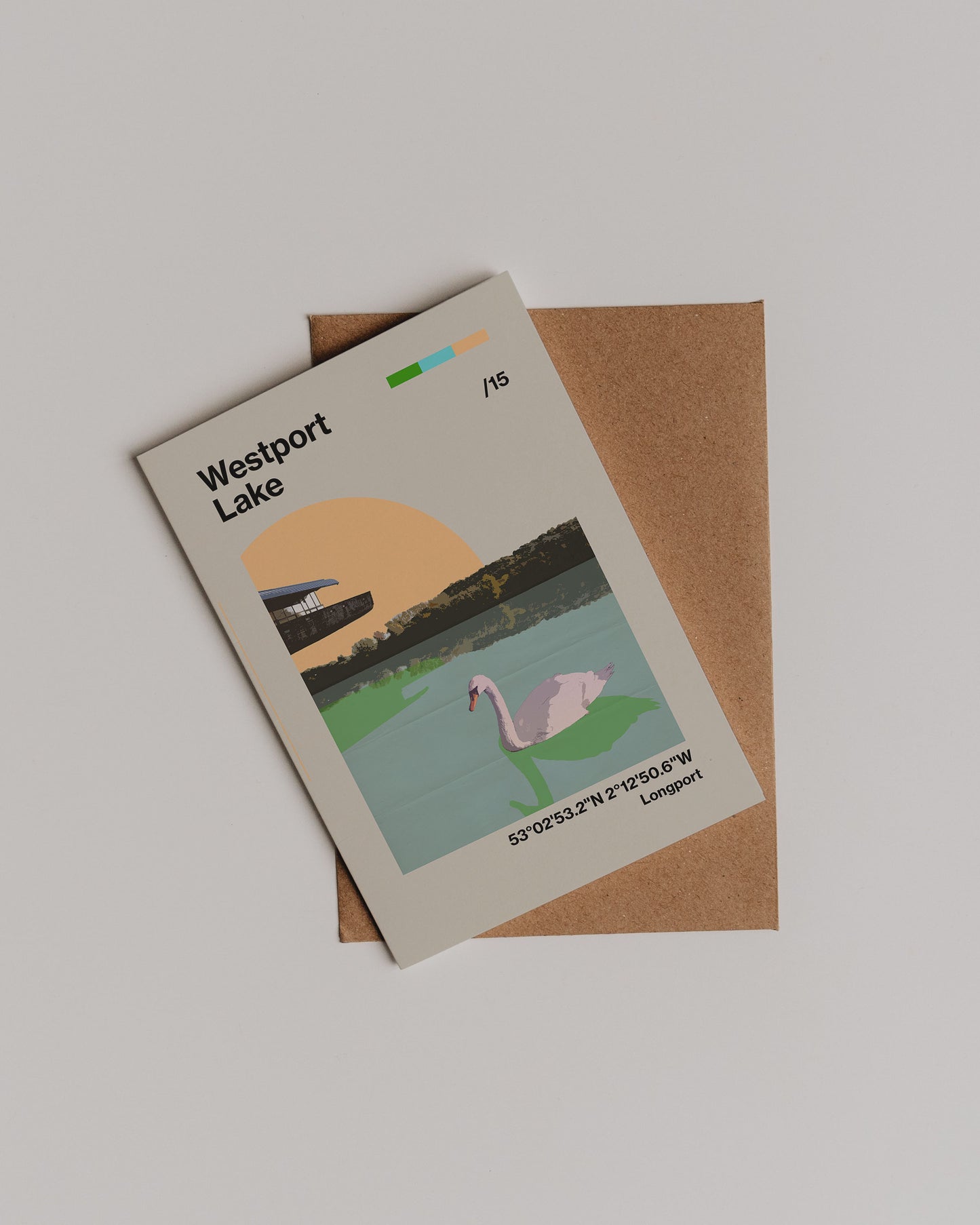 The Westport Lake Greetings Card is perfect for nature lovers, featuring an illustrated swan on the lake with trees and a building in the background. Printed on eco-friendly cardstock and paired with a brown envelope.